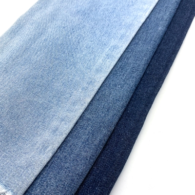 GX-AF  S21B1039-3  Width: 176-178cm  Weight: 8.5OZ  Shrinkage: Warp: 7-8%, Weft: 2-3%  Weave: Left-hand twill  Composition: 83% Cotton, 5.5% Tencel , 11.5% Rayon side view